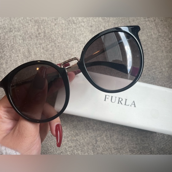 Furla sunglasses, black frame with purple tips towards ear piece